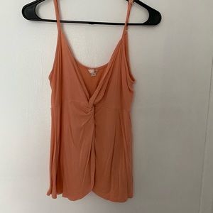 Peach colored wrap top